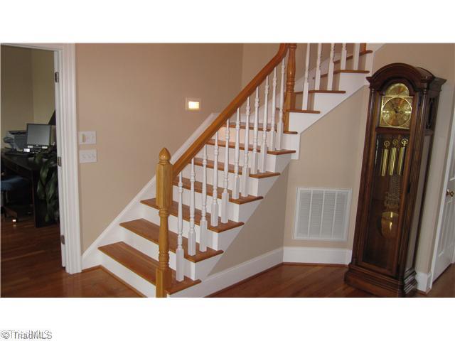 5702 Wolf Ridge Court Oak Ridge, NC 27310 - Photo 2 of 16 Entry. Welcoming entry with beautiful hardwoods as far as you can see.