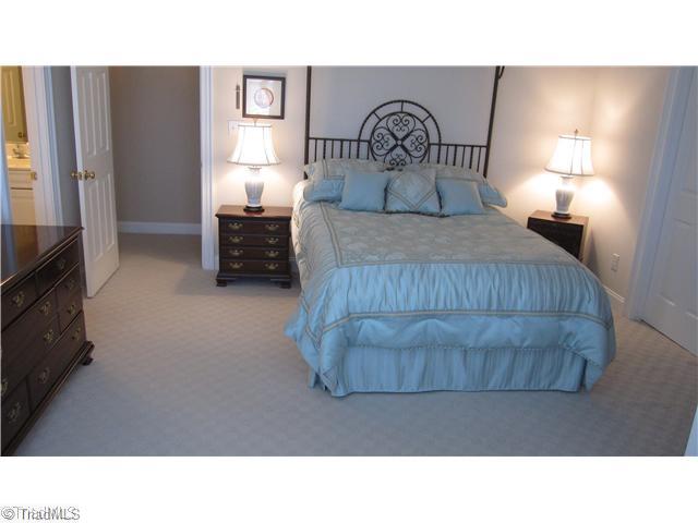 5702 Wolf Ridge Court Oak Ridge, NC 27310 - Photo 11 of 16 2nd Bedroom. Spacious bedrooms in this home with good closet space.