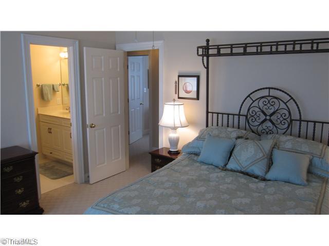 5702 Wolf Ridge Court Oak Ridge, NC 27310 - Photo 12 of 16 2nd Bedroom. This bedroom shares one of the full upstairs baths