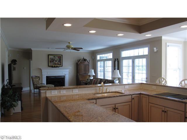 5702 Wolf Ridge Court Oak Ridge, NC 27310 - Photo 5 of 16 Living Room. Kitchen opens to Living Room and breakfast area,