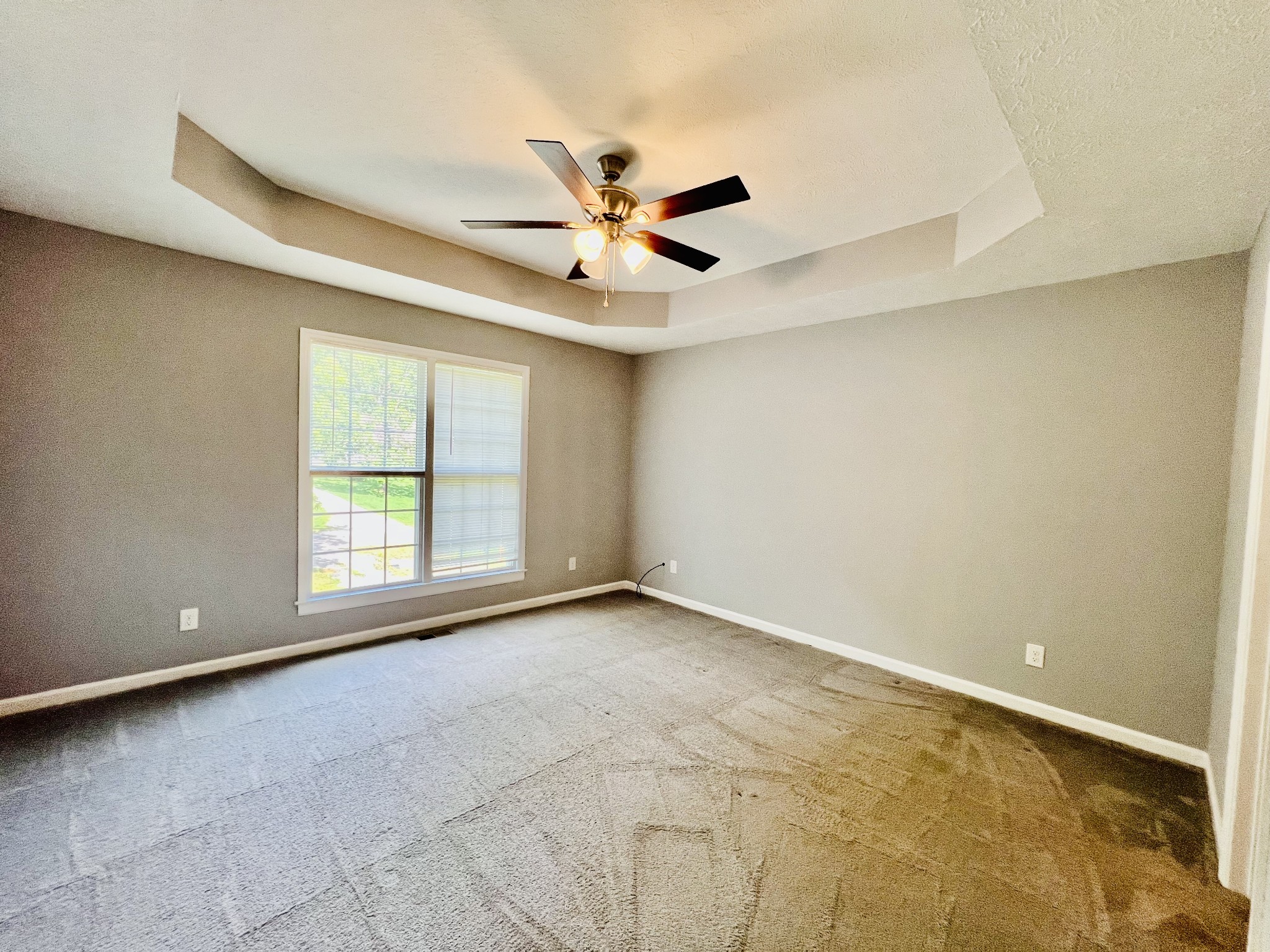 730 Bunker Hill Road Pulaski, TN 38478 - Photo 8 of 23 a view of an empty room with a window