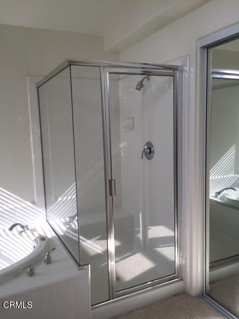 1673 Paseo Castille Camarillo, CA 93010 - Photo 11 of 20 a bathroom with a glass shower door