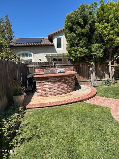 1673 Paseo Castille Camarillo, CA 93010 - Photo 19 of 20 a view of a house with backyard and sitting area