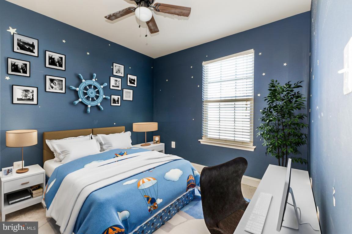 4511 Potomac Highlands Circle Triangle, VA 22172 - Photo 12 of 31 a bedroom with bed and a window