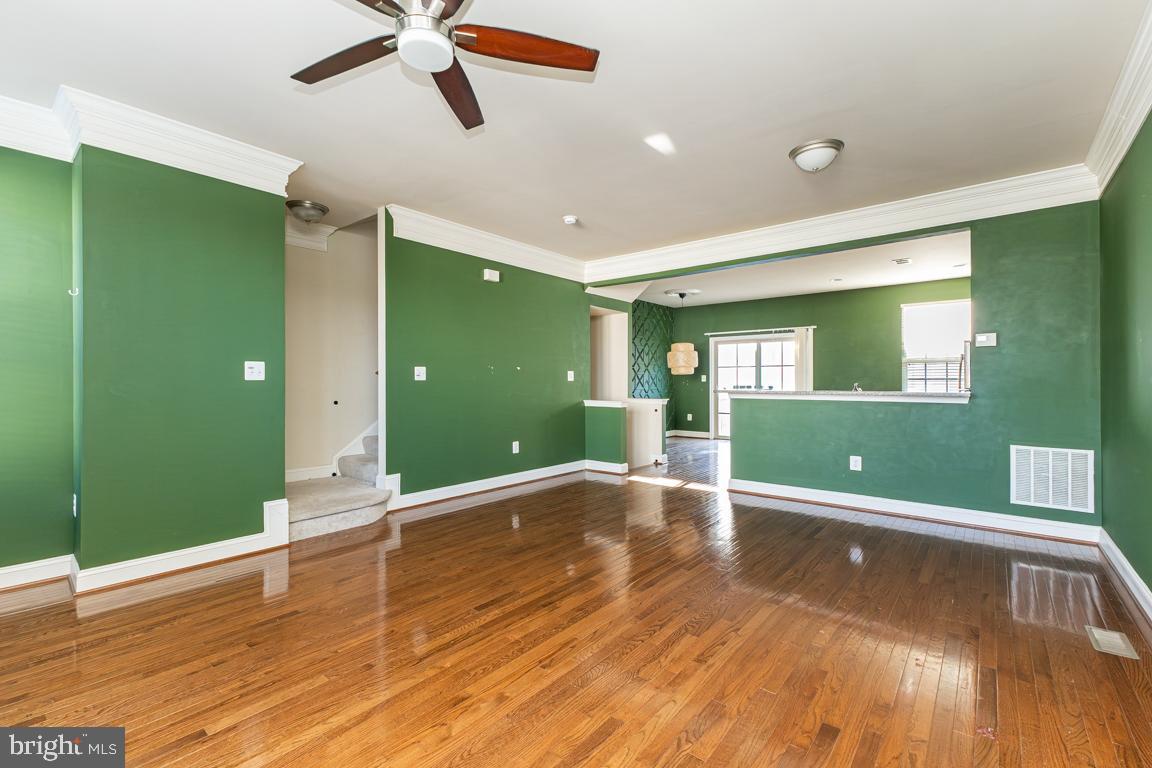 4511 Potomac Highlands Circle Triangle, VA 22172 - Photo 17 of 31 a view of livingroom with hardwood floor and ceiling fan