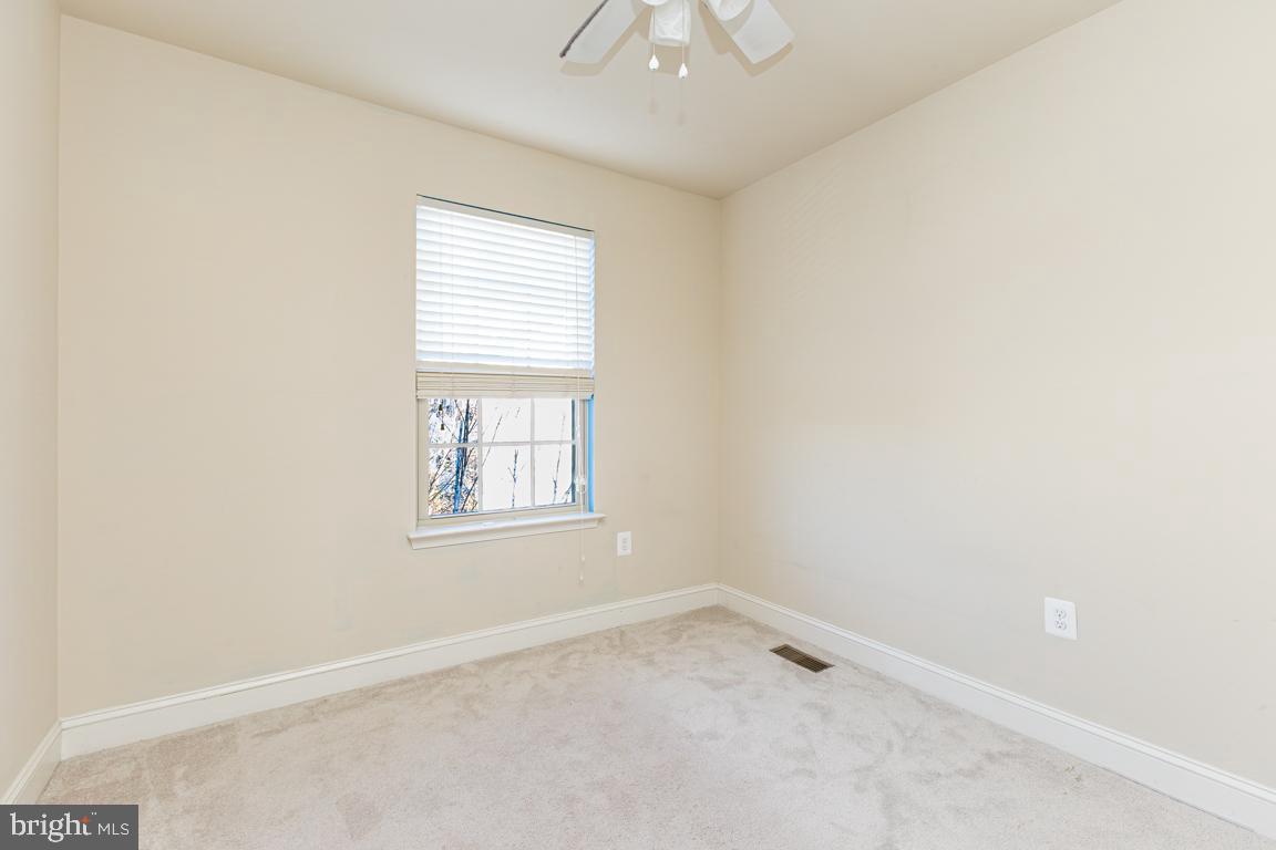 4511 Potomac Highlands Circle Triangle, VA 22172 - Photo 23 of 31 an empty room with a window