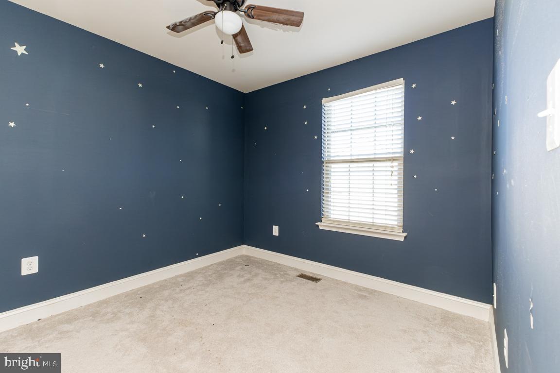 4511 Potomac Highlands Circle Triangle, VA 22172 - Photo 24 of 31 a view of an empty room with a window
