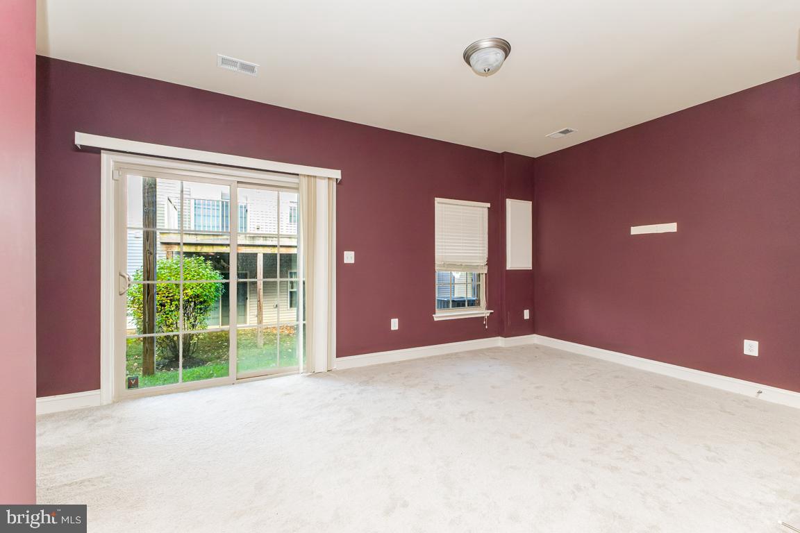 4511 Potomac Highlands Circle Triangle, VA 22172 - Photo 25 of 31 a view of a livingroom with a staircase