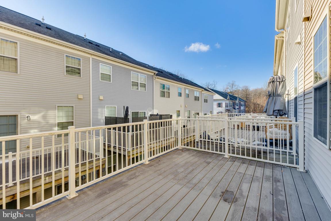 4511 Potomac Highlands Circle Triangle, VA 22172 - Photo 27 of 31 a view of a balcony with wooden floor