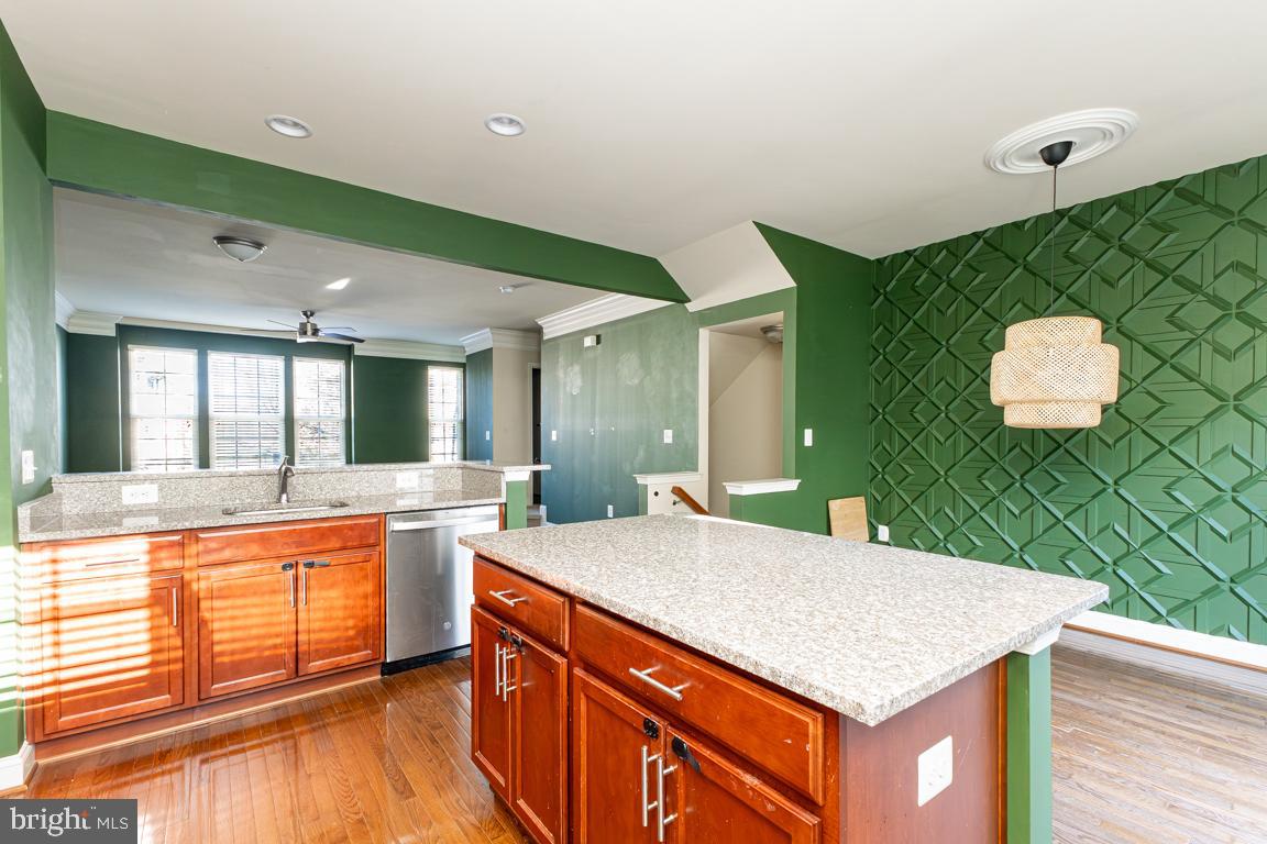 4511 Potomac Highlands Circle Triangle, VA 22172 - Photo 5 of 31 a kitchen with a sink and a large window
