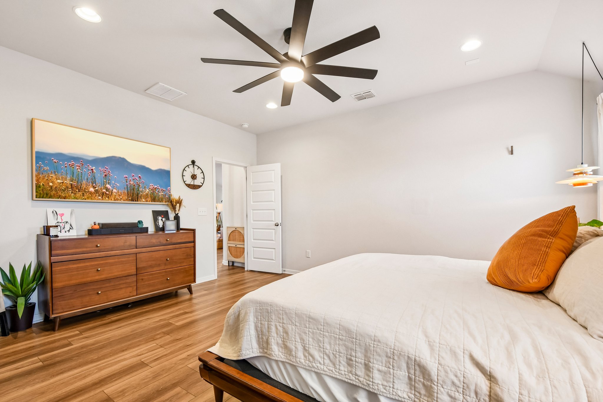 10700 Sentinel Drive Austin, TX 78747 - Photo 16 of 27 The room gives calming vibes with warm floors and tall ceilings.