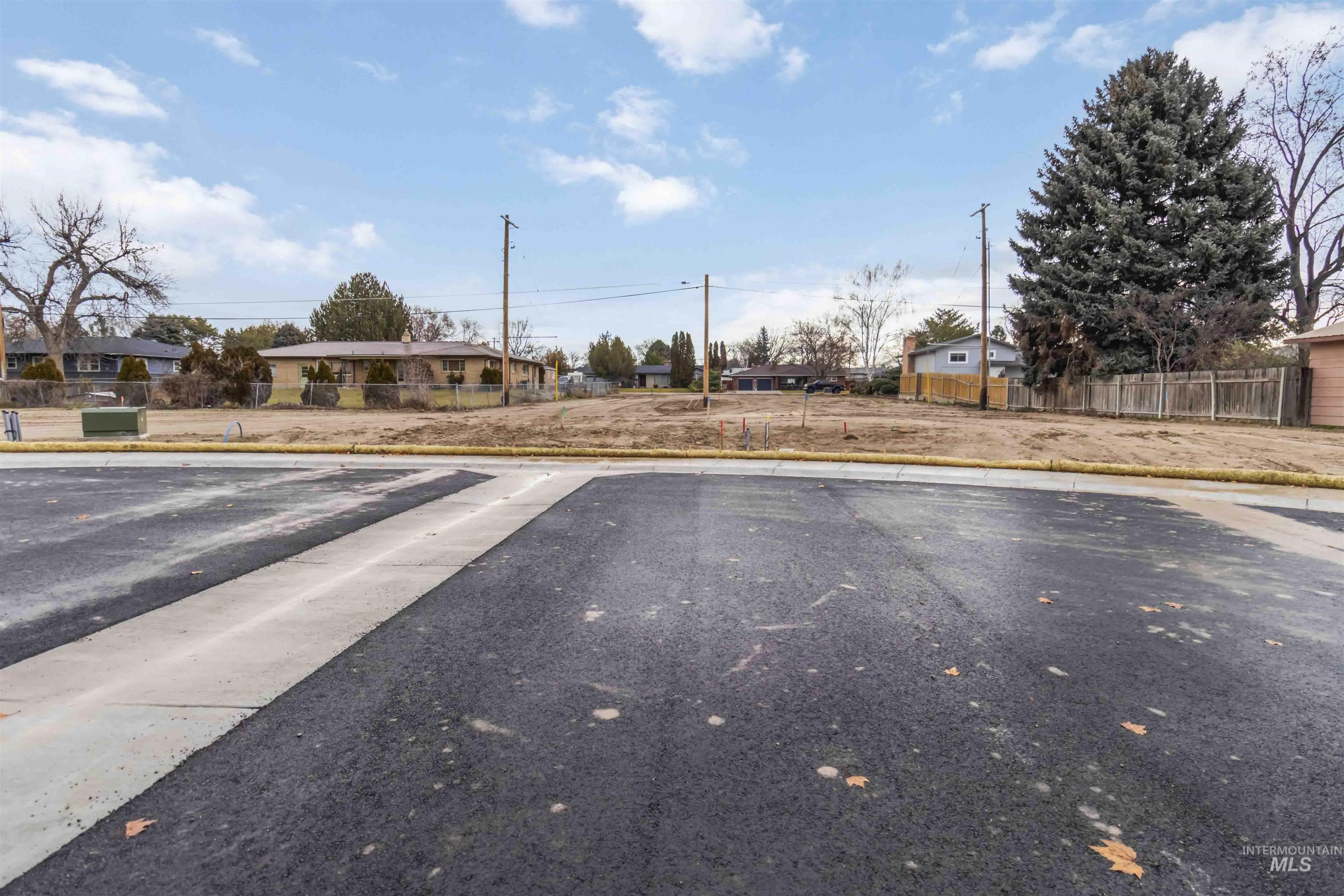 Oregon Avenue Caldwell, ID 83605 - Photo 35 of 42 View of asphalt road with a residential view and curbs