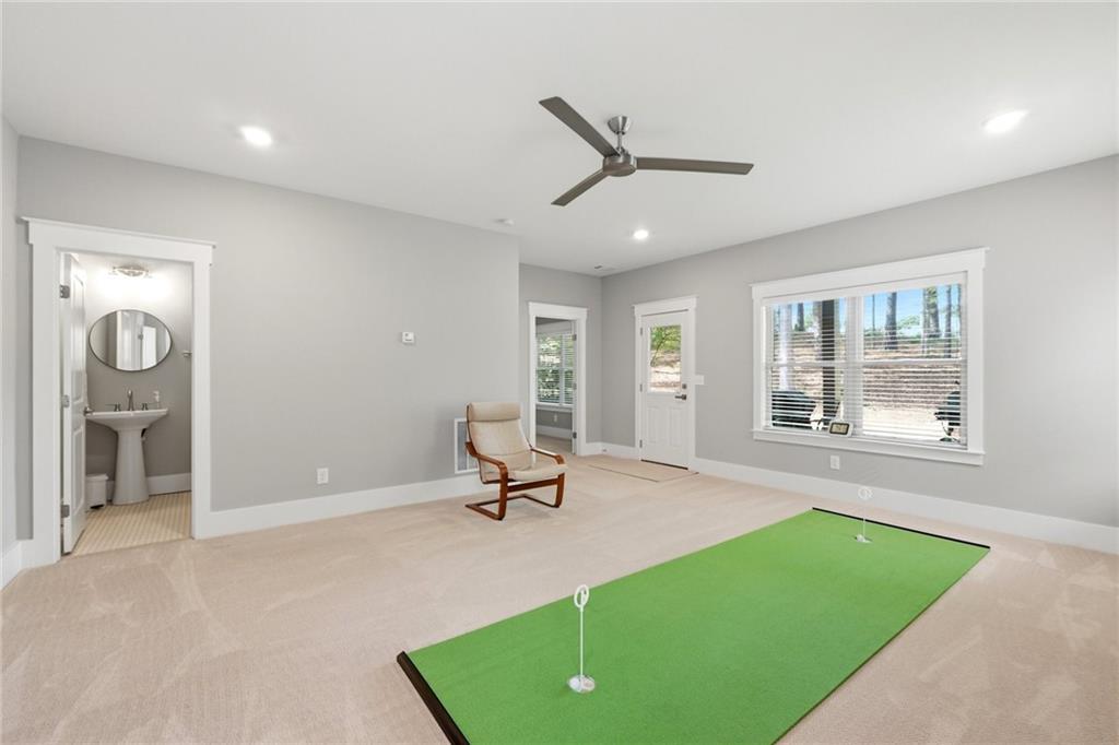 206 Trecastle Square Canton, GA 30114 - Photo 37 of 49 a view of a room with a window and a ceiling fan