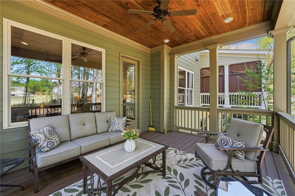 206 Trecastle Square Canton, GA 30114 - Photo 43 of 49 a outdoor living space with furniture and a potted plant