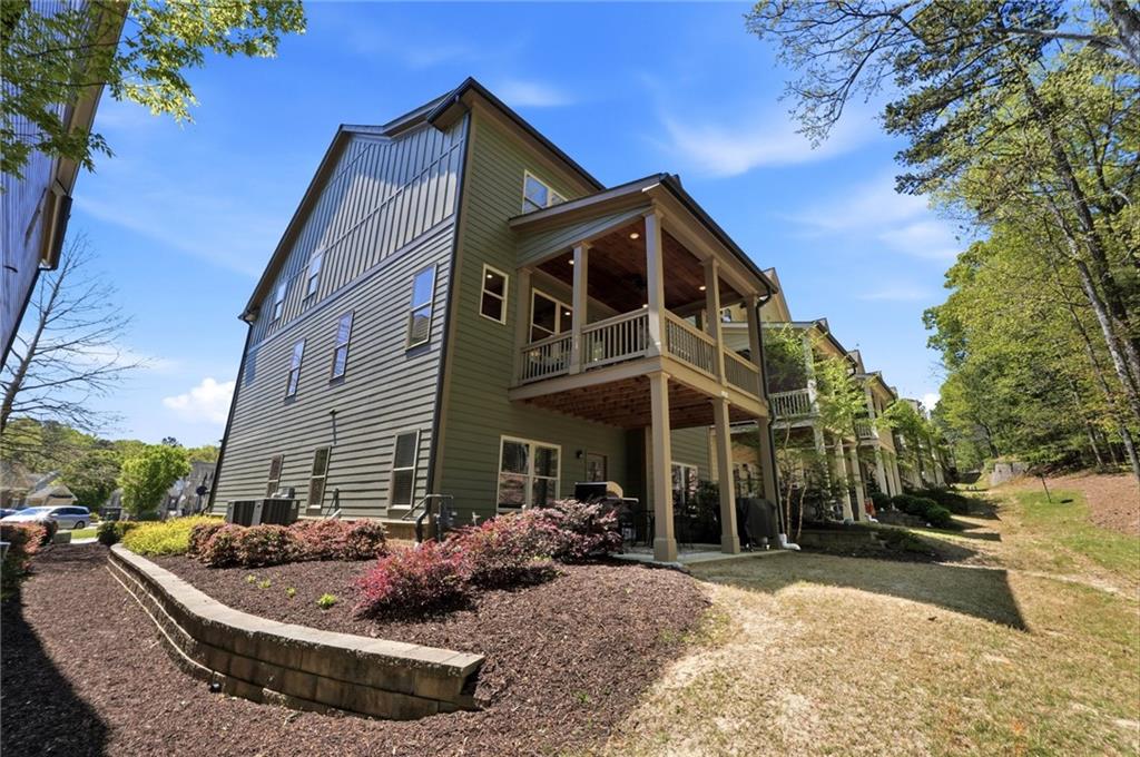 206 Trecastle Square Canton, GA 30114 - Photo 45 of 49 a view of a house with a patio