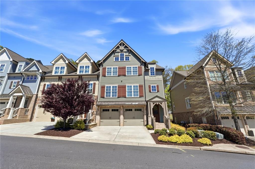206 Trecastle Square Canton, GA 30114 - Photo 47 of 49 a front view of a house with garden