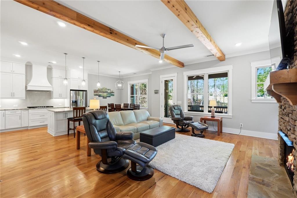 206 Trecastle Square Canton, GA 30114 - Photo 5 of 49 a living room with furniture and a wooden floor