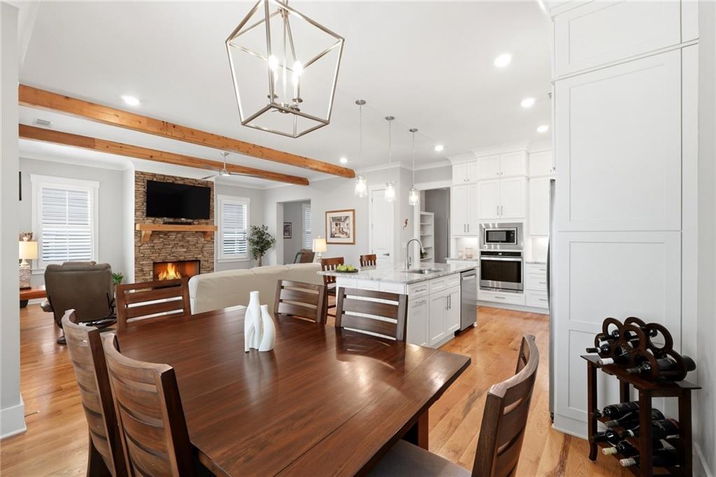206 Trecastle Square Canton, GA 30114 - Photo 9 of 49 a large kitchen with a table and chairs