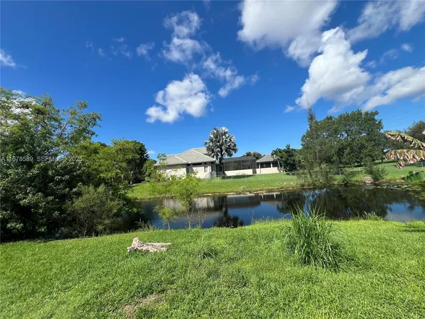 a view of a lake from a yard