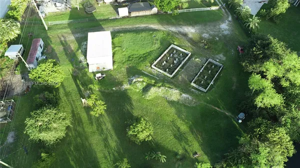 a view of a lake with a yard