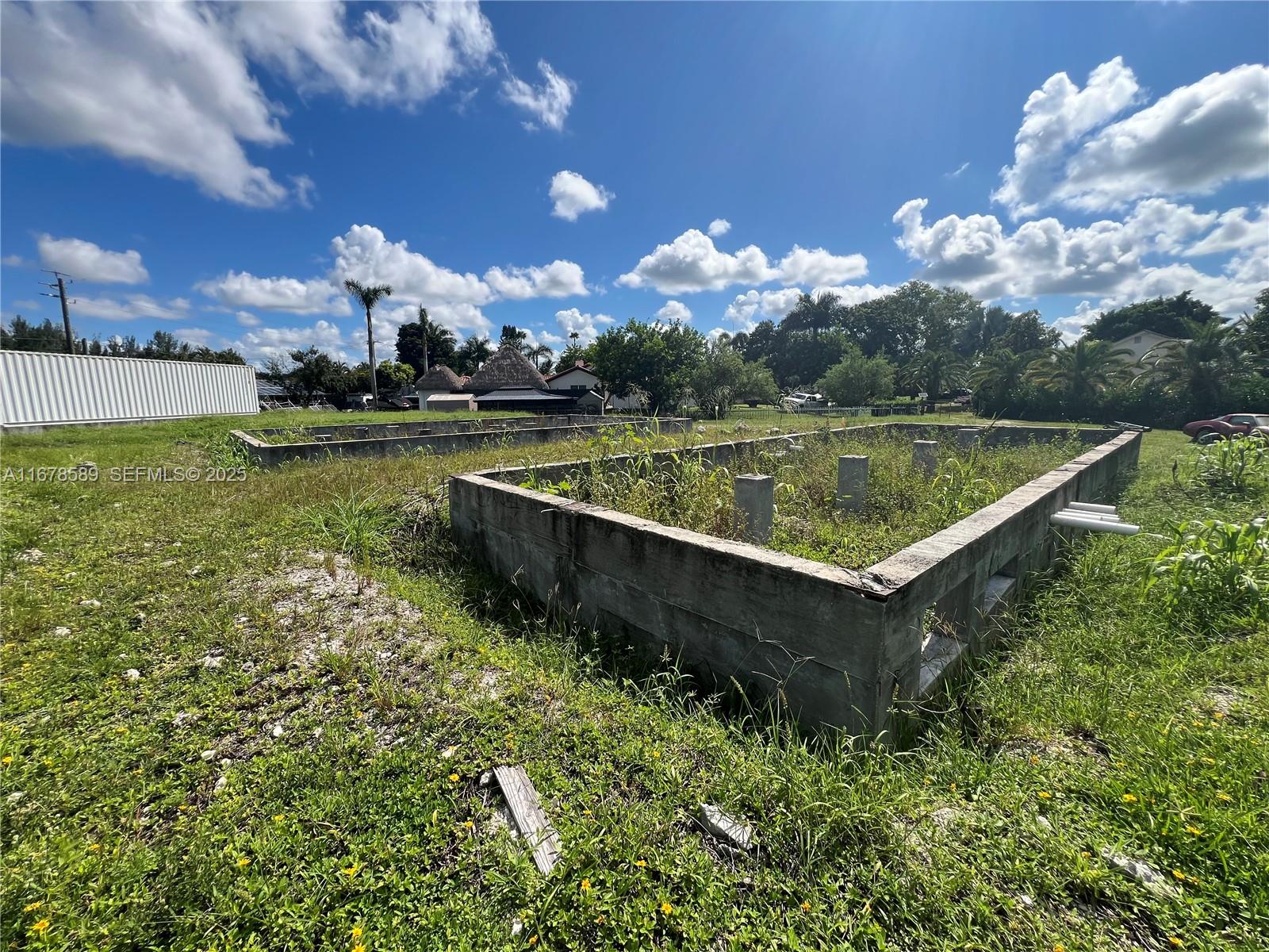 20321 Southwest 48th Street Southwest Ranches, FL 33332 - Photo 20 of 46 a view of a lake with a yard