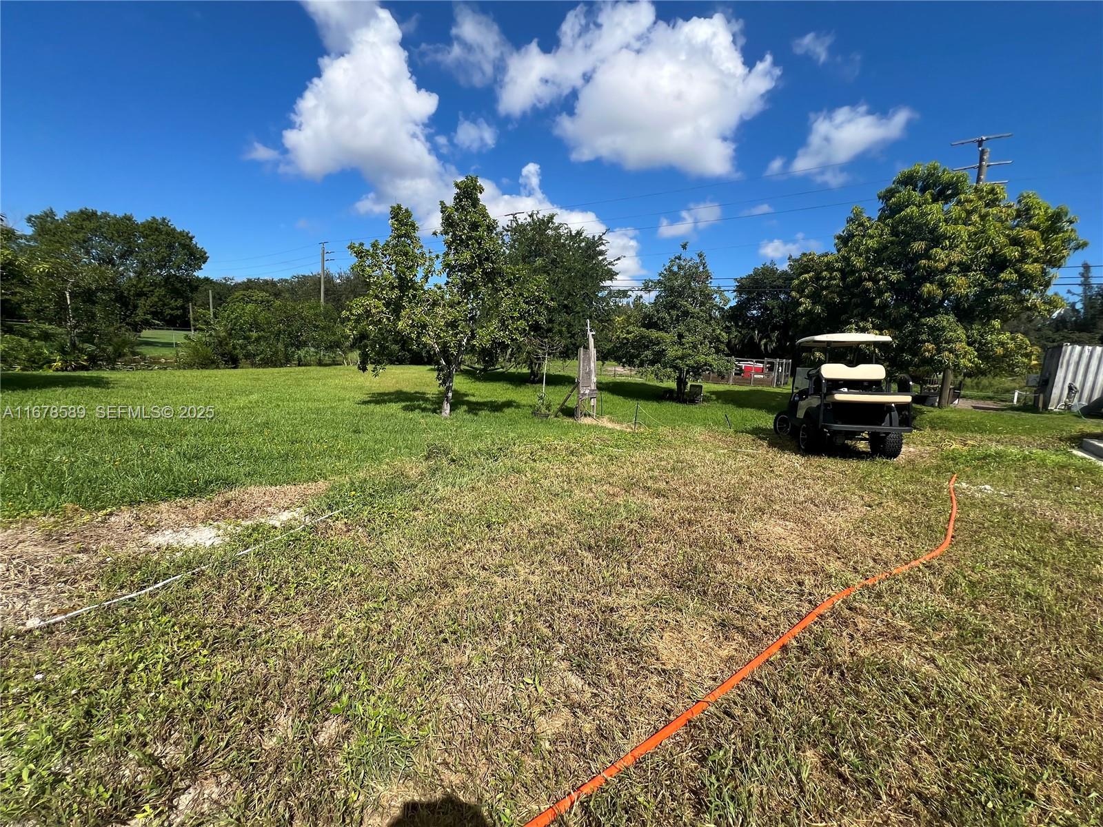 20321 Southwest 48th Street Southwest Ranches, FL 33332 - Photo 22 of 46 a backyard of a house with lots of green space
