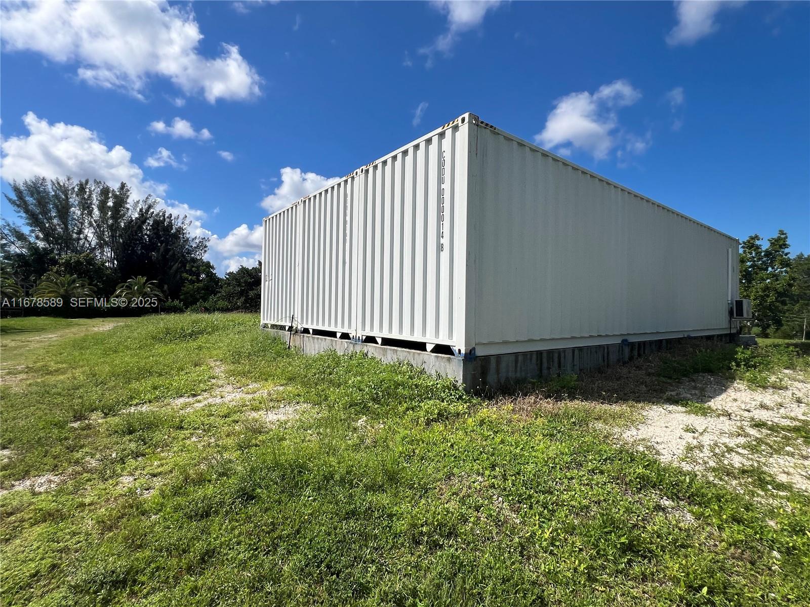 20321 Southwest 48th Street Southwest Ranches, FL 33332 - Photo 37 of 46 a view of backyard with garden