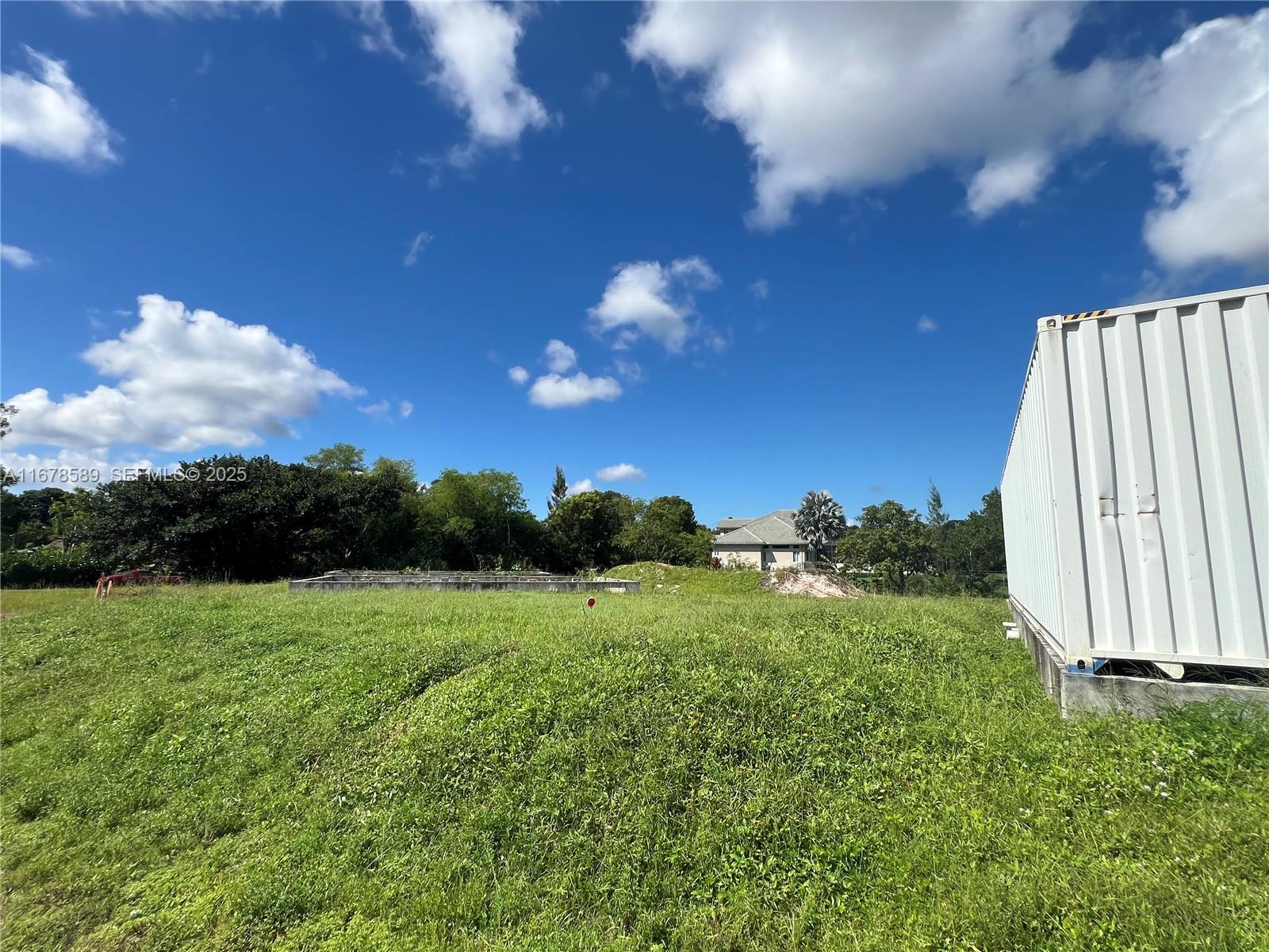 20321 Southwest 48th Street Southwest Ranches, FL 33332 - Photo 38 of 46 a view of a garden with a slide