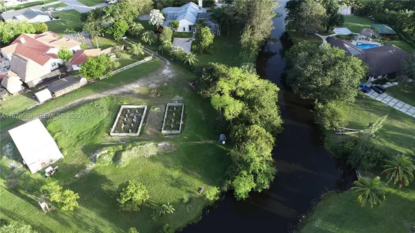 a view of a golf course with a lake