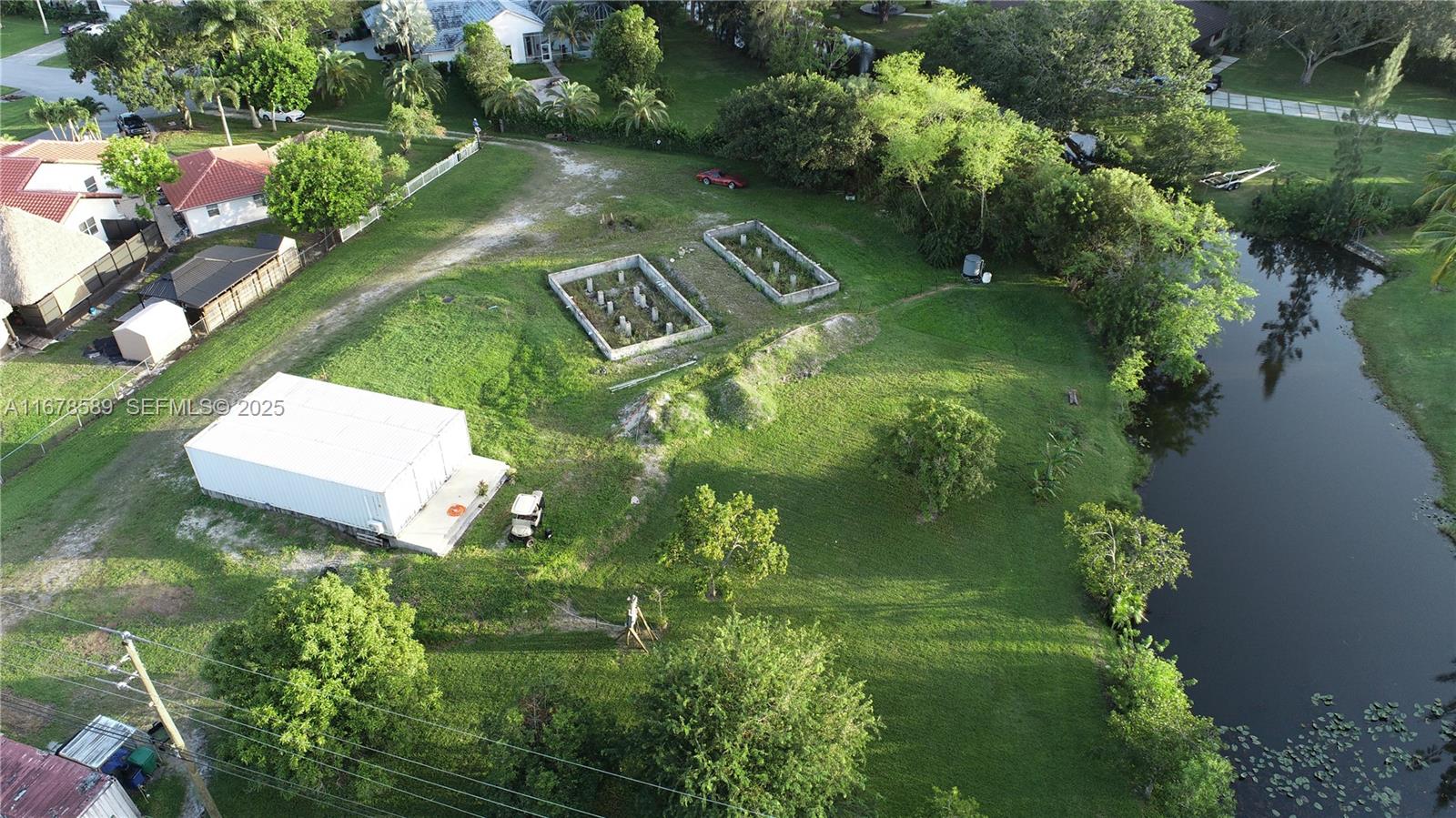 20321 Southwest 48th Street Southwest Ranches, FL 33332 - Photo 46 of 46 an aerial view of a house with a yard