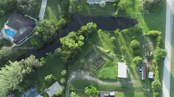 a view of a garden with a lake