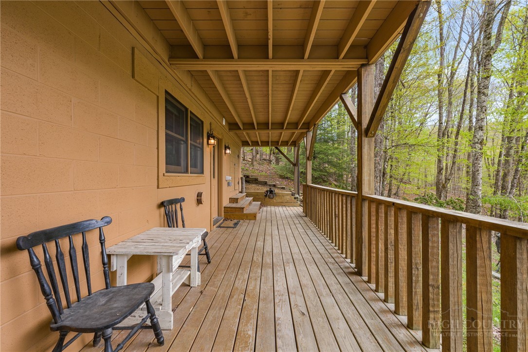 259 Greenbriar Road Beech Mountain, NC 28604 - Photo 31 of 41 a view of balcony with wooden floor and outdoor seating