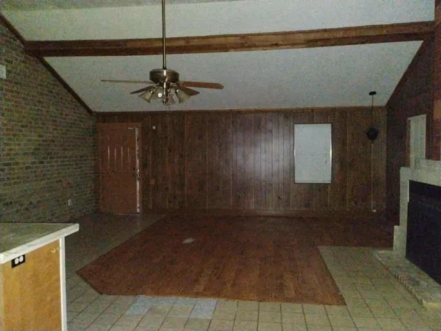 a room with table and chairs