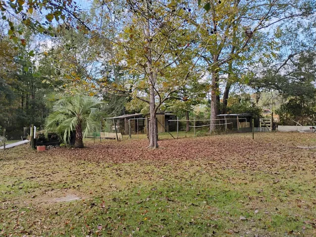 a backyard of a house with seating space