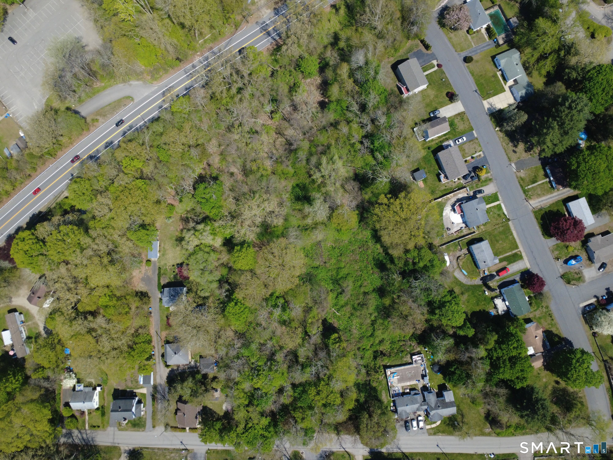 84 Corning Road Norwich, CT 06360 - Photo 9 of 12 an aerial view of a residential houses with yard