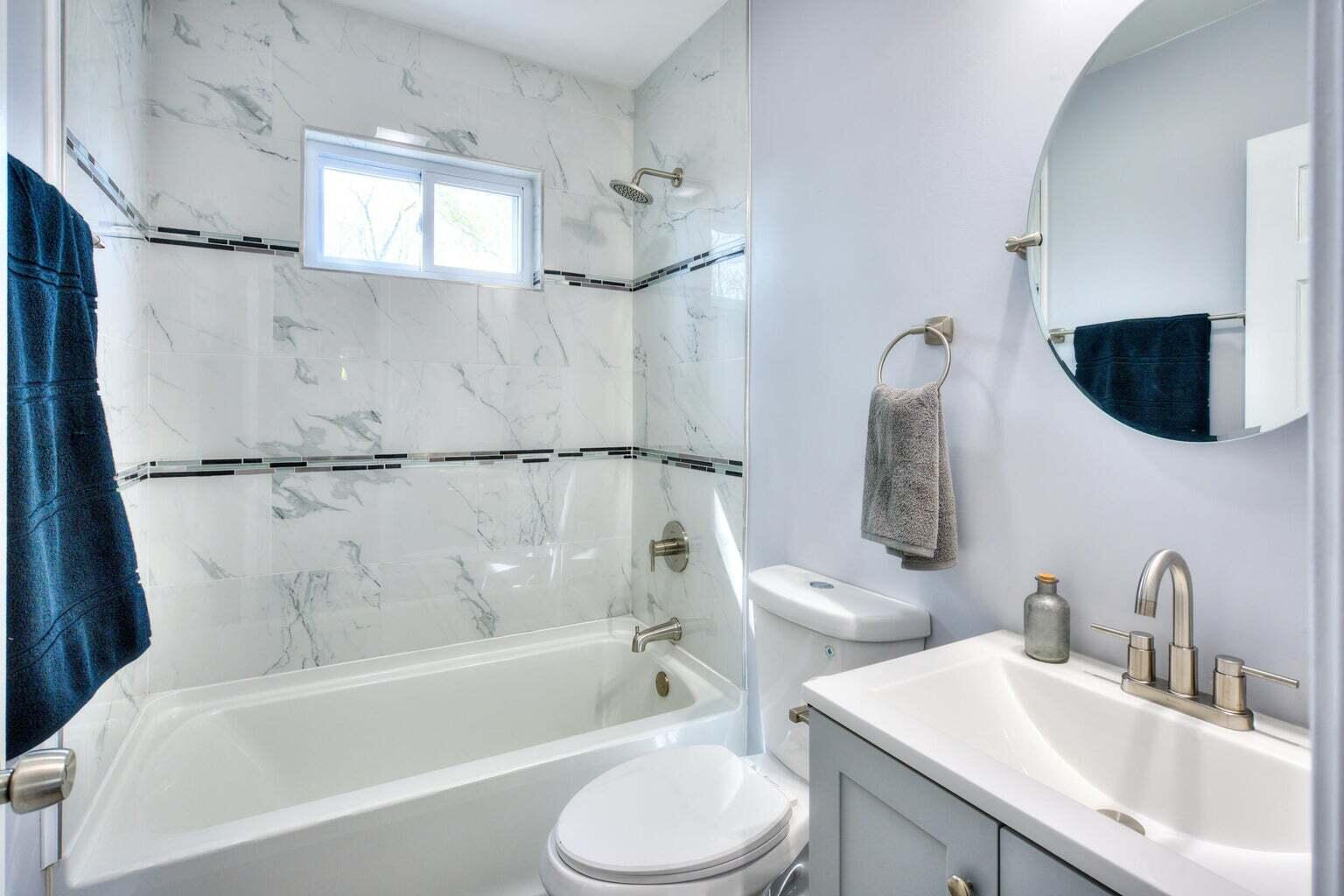 1330 Taney Place Gary, IN 46404 - Photo 10 of 19 a bathroom with a sink toilet and shower