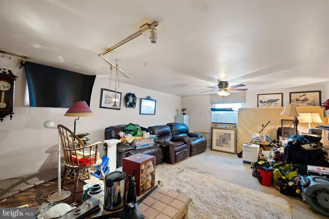 a living room filled with furniture and a couch