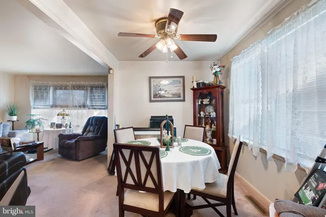 a view of a livingroom with furniture and window