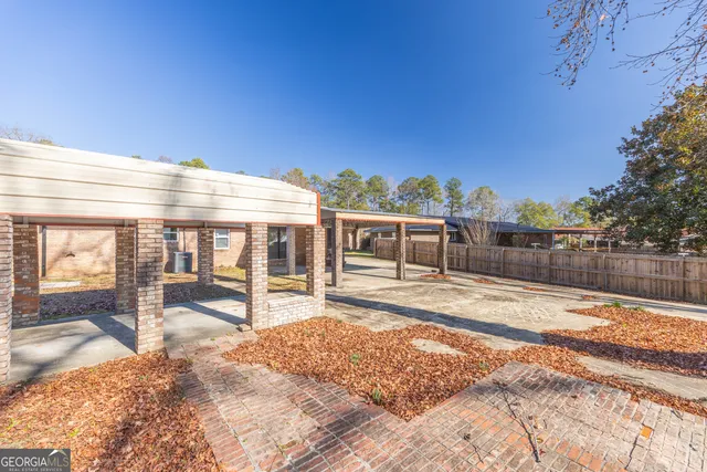 a view of a house with a patio