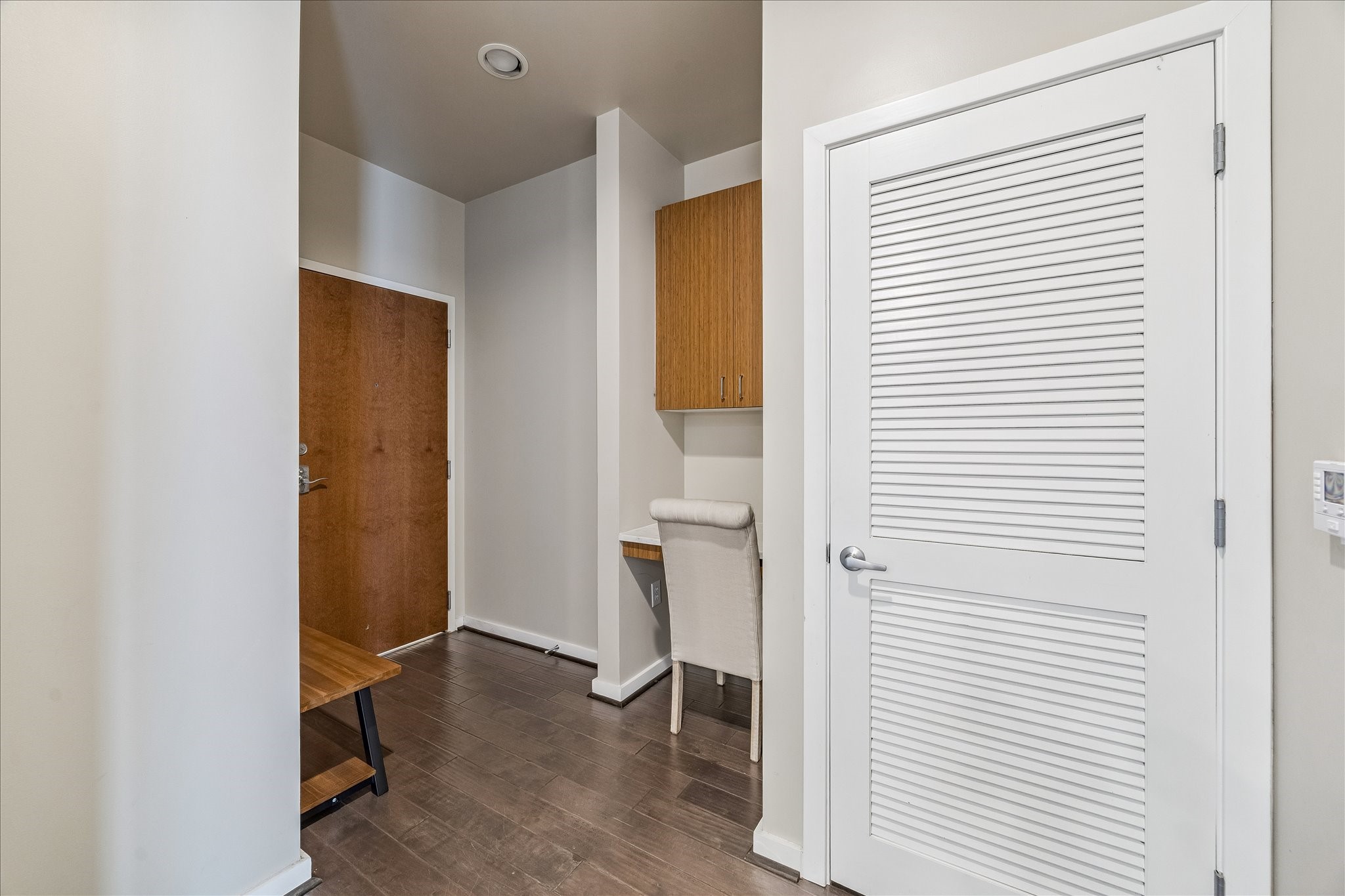 5925 Almeda Road, Unit 12704 Houston, TX 77004 - Photo 9 of 31 A welcoming entry foyer offers a functional drop zone with additional storage and workspace. The clean design and upscale finishes immediately set the tone for the sophisticated interior.