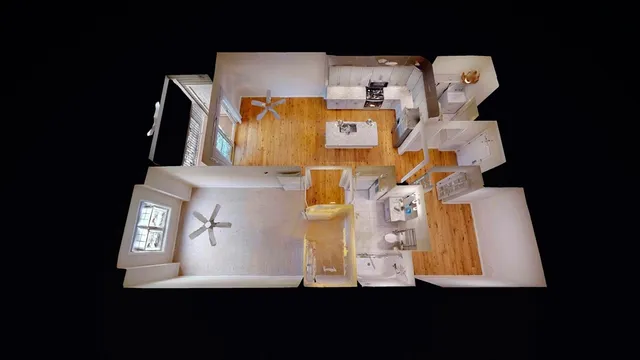 front view of a brick house with a yard