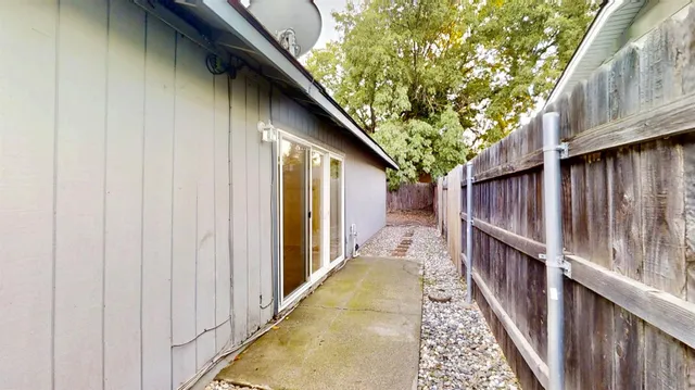 a view of balcony with wooden floor and stairs
