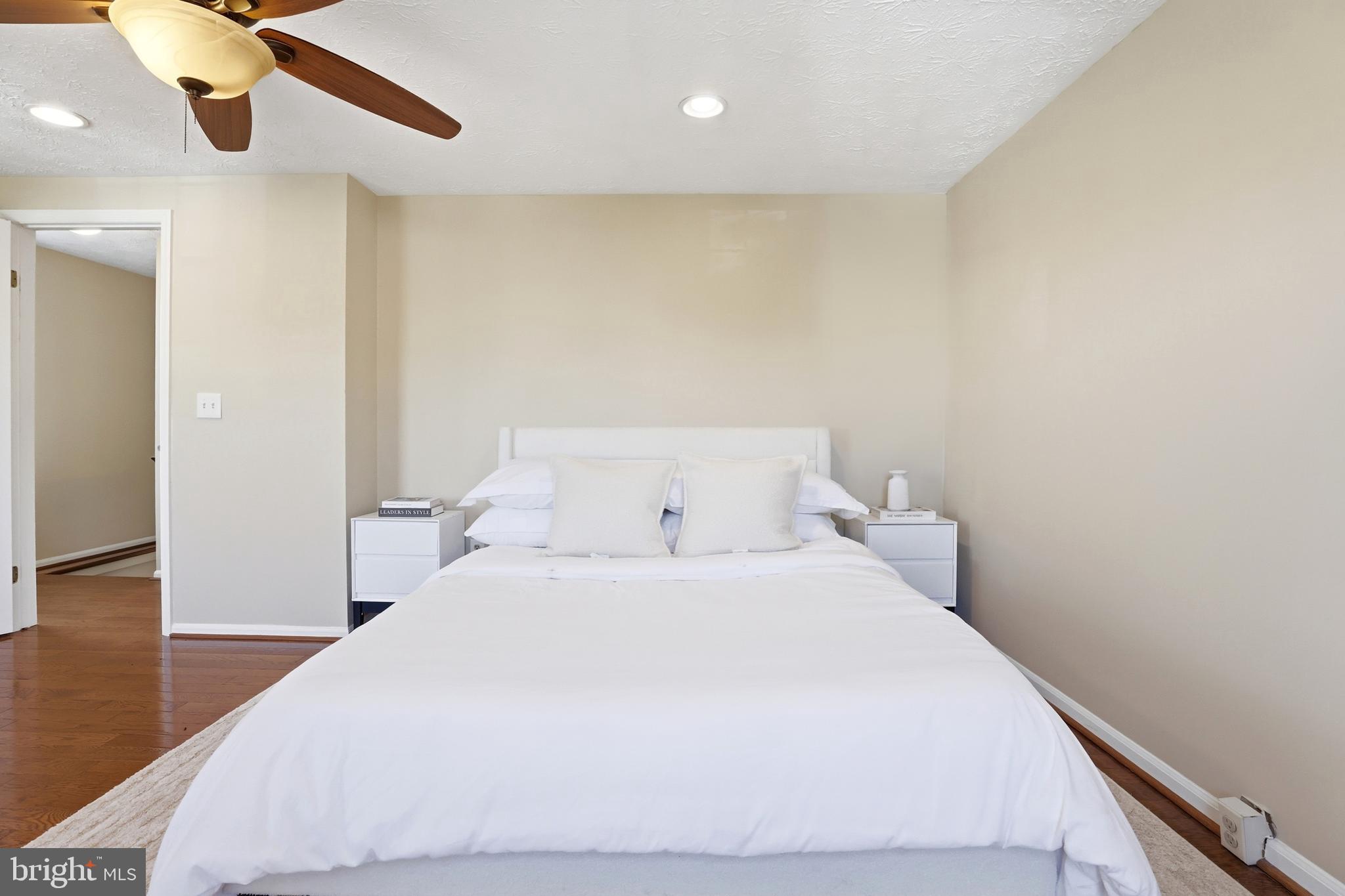 6167 Morning Glory Road Alexandria, VA 22310 - Photo 21 of 39 a large white bed in a white room