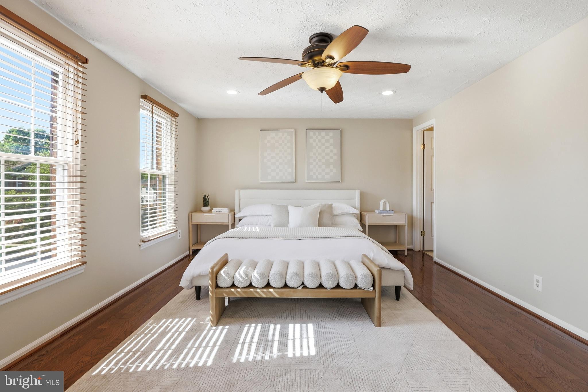 6167 Morning Glory Road Alexandria, VA 22310 - Photo 25 of 39 a bedroom with a large bed chandelier and a window