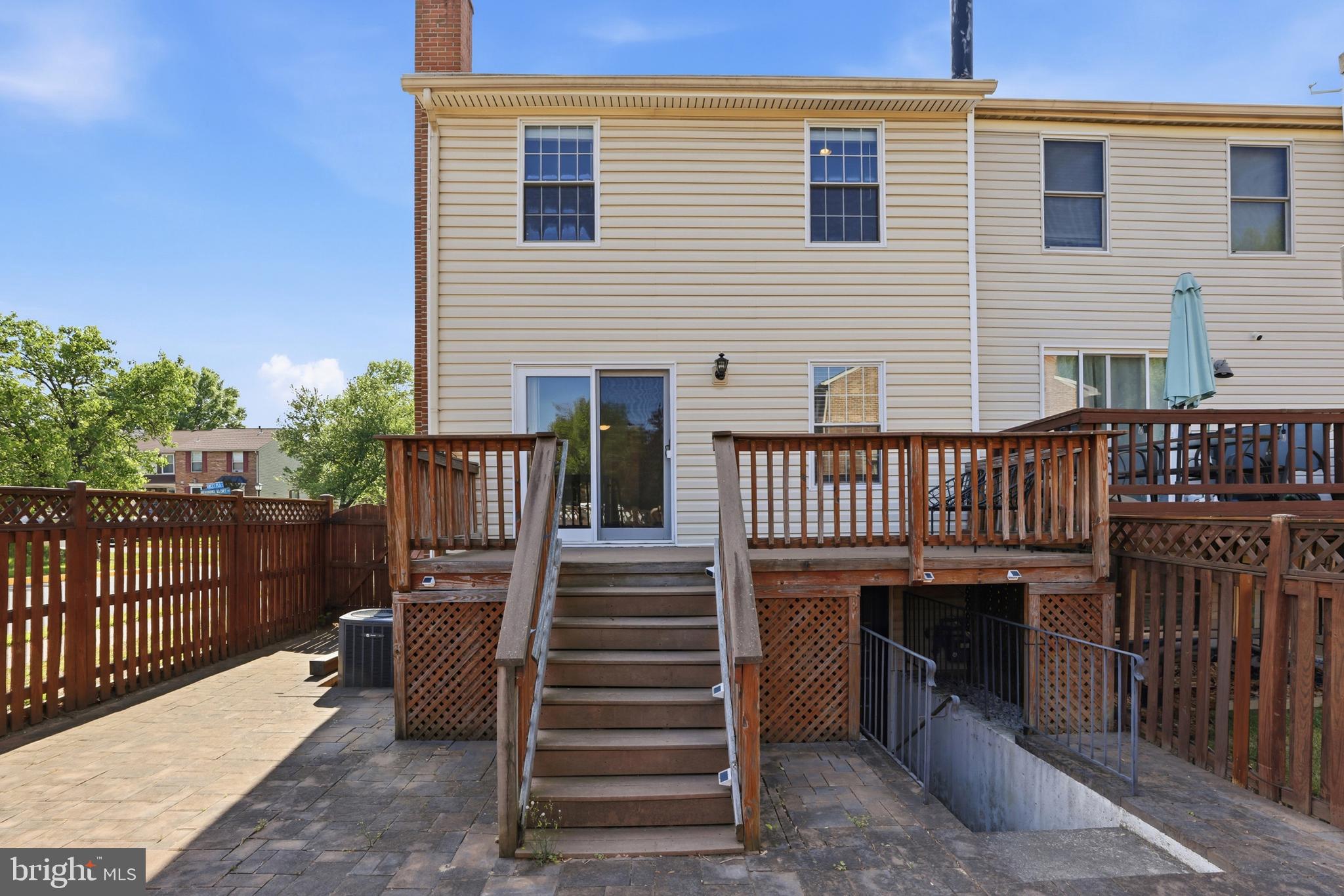 6167 Morning Glory Road Alexandria, VA 22310 - Photo 37 of 39 a view of a house with wooden deck front of house