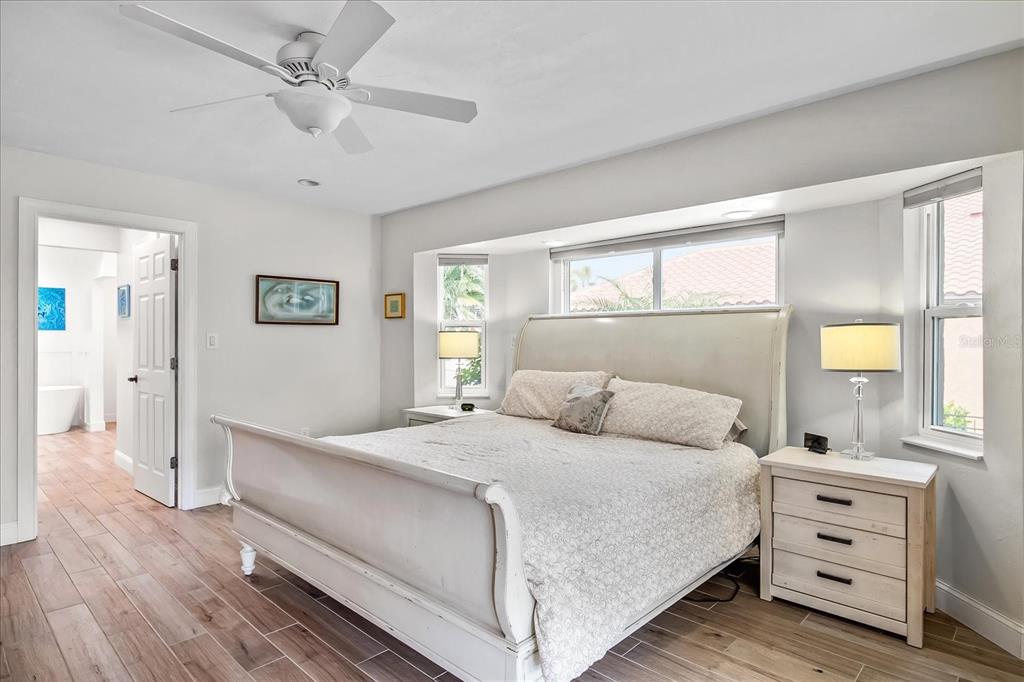 184 Colony Point Drive Punta Gorda, FL 33950 - Photo 27 of 58 a bedroom with a bed and a window