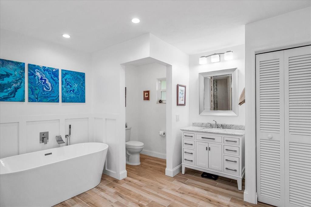 184 Colony Point Drive Punta Gorda, FL 33950 - Photo 30 of 58 a spacious bathroom with a toilet sink double vanity and bathtub