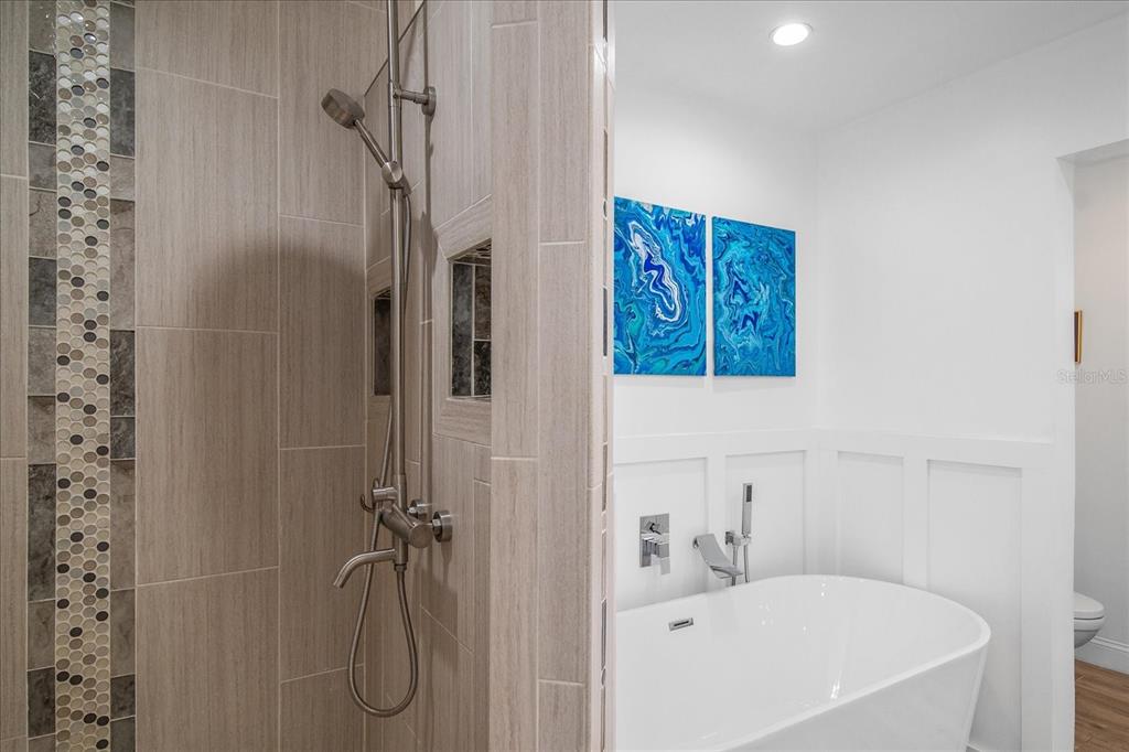 184 Colony Point Drive Punta Gorda, FL 33950 - Photo 31 of 58 a bathroom with a bathtub and shower