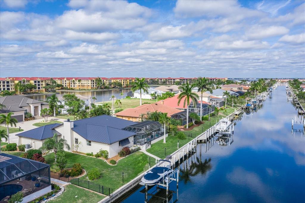 184 Colony Point Drive Punta Gorda, FL 33950 - Photo 49 of 58 a view of a swimming pool and outside seating area