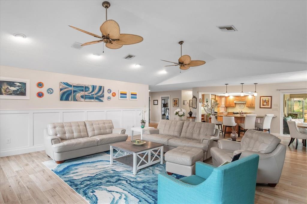 184 Colony Point Drive Punta Gorda, FL 33950 - Photo 6 of 58 a living room with furniture and a large window
